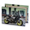 a black and yellow motorcycle parked in parking lot smoky canvas - Image 4