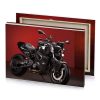a black motorcycle parked in red room garnet canvas - Image 4