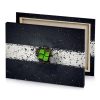 a green leaf is growing through white line olive drab canvas - Image 4
