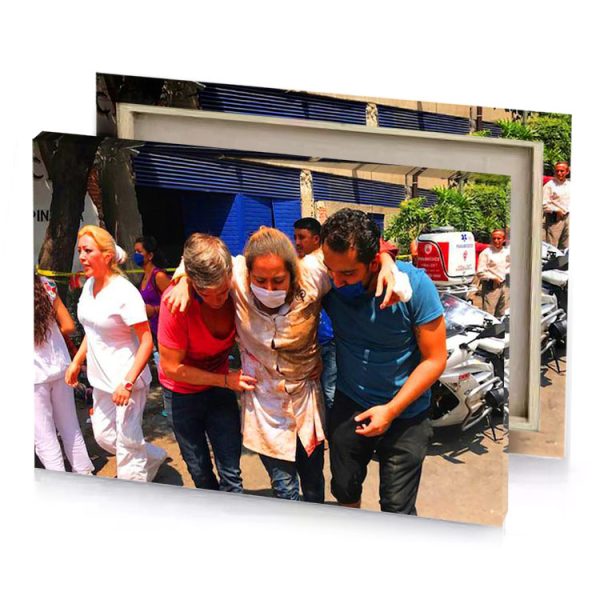 a group of people standing around motorcycle maroon canvas - Image 4