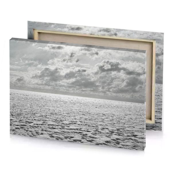 a large body of water with clouds in the background silver canvas - Image 4
