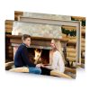 a man and woman sitting in front of fireplace silver canvas - Image 4