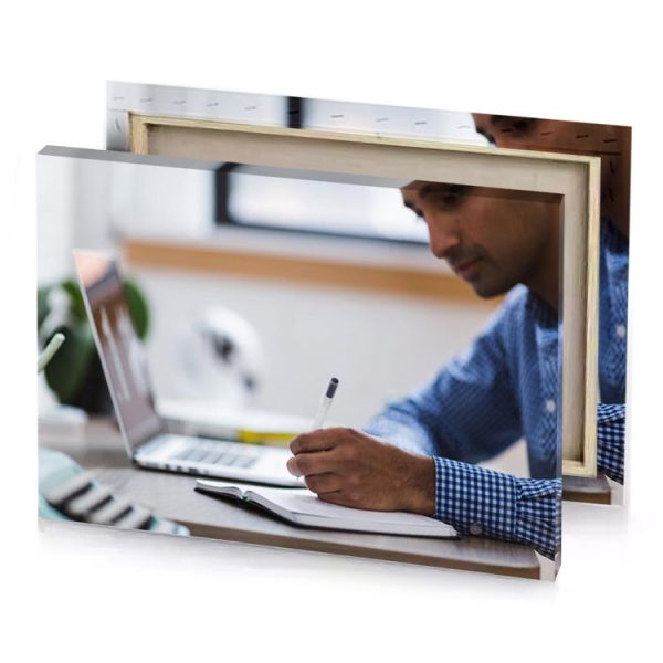 a man writing on piece of paper silver canvas - Image 4
