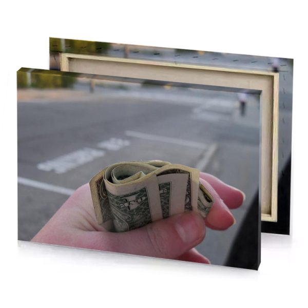 a person holding dollar bill in their hand gray canvas - Image 4
