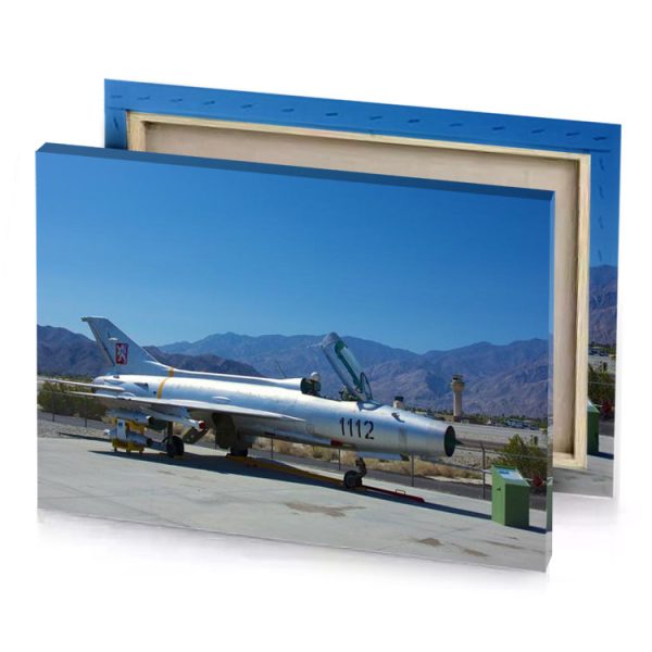a plane parked on the tar steel blue canvas - Image 4