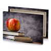 a red apple sitting on top of stack books gray canvas - Image 4