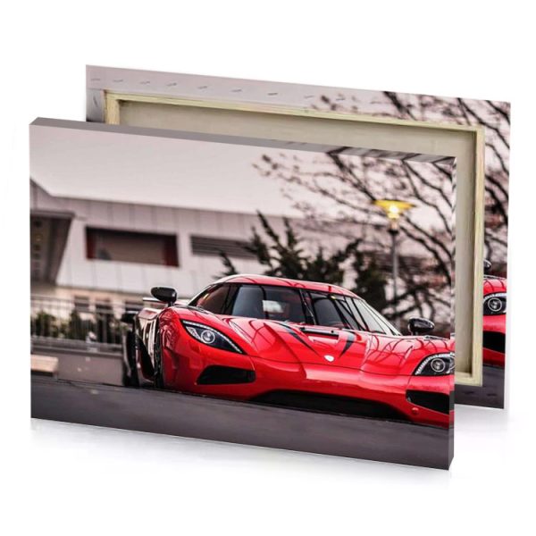 a red ferrari car parked in front of building lust canvas - Image 4