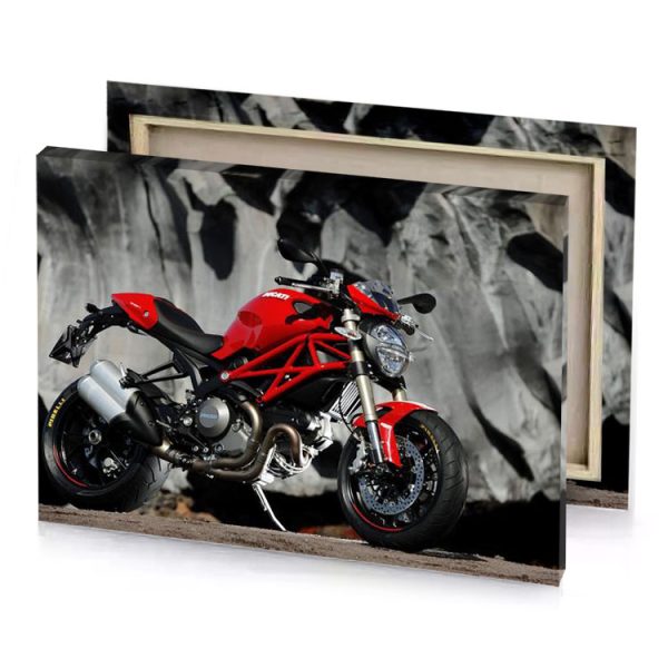 a red motorcycle parked in front of rock brown canvas - Image 4