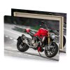 a red motorcycle parked on the side of road spanish canvas - Image 4