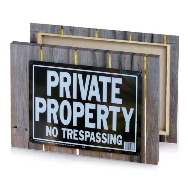 a sign on wooden fence that says private property light steel blue canvas - Image 4