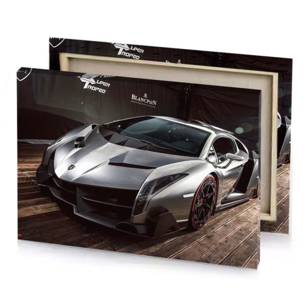 a silver car parked in front of black backdrop gray canvas - Image 4