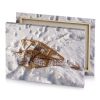 a snow covered snowboard with pair of skis garnet canvas - Image 4