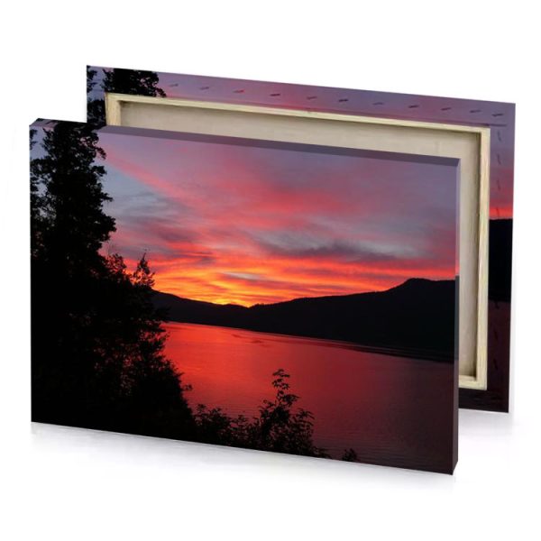 a sunset over the water with trees and mountains in vermilion canvas - Image 4