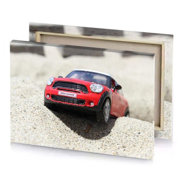 a toy car is sitting on rock lust canvas - Image 4