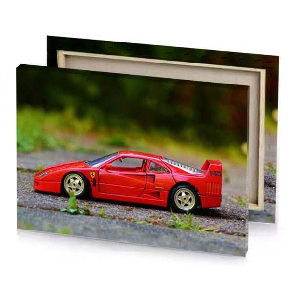 a toy car is sitting on the ground firebrick canvas - Image 4