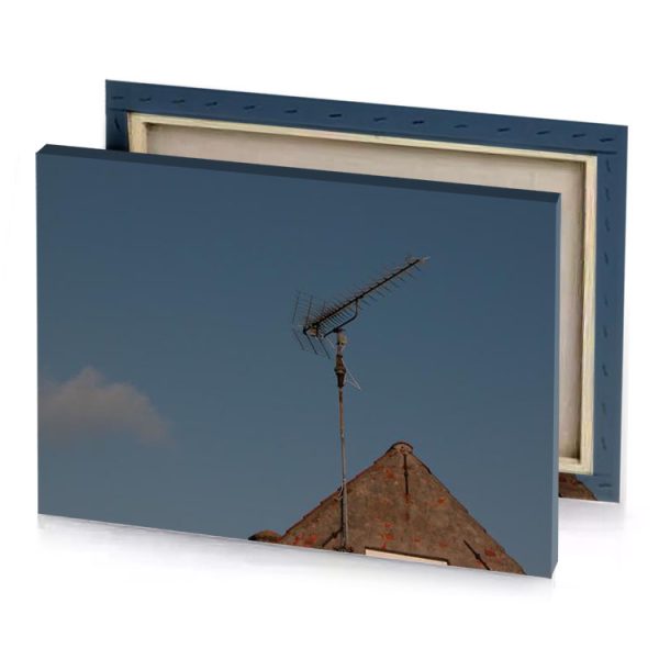 a weather vane on building garnet canvas - Image 4