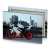 a white and orange motorcycle parked on street smoky black canvas - Image 4