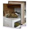 a cat laying on top of microwave dark olive green canvas - Image 4