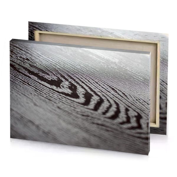 a close up of wooden table with black and white gray canvas - Image 4
