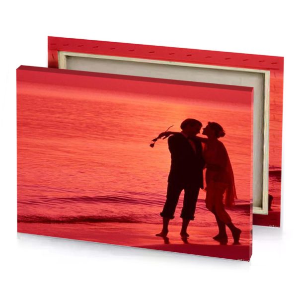 a couple kissing on the beach at sunset coral canvas - Image 4