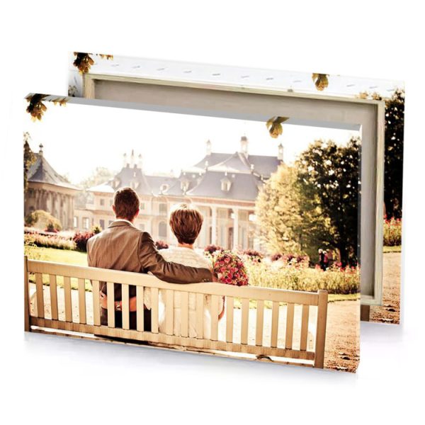 a couple sitting on bench in park bisque canvas - Image 4