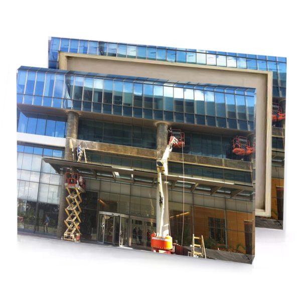 a large building with crane on the side of it dark olive green canvas - Image 4