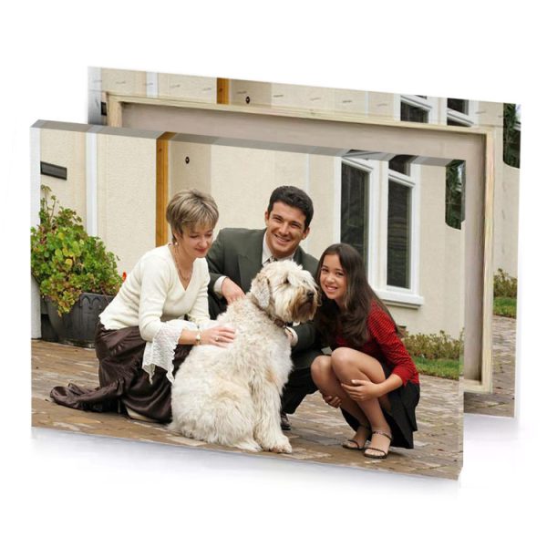 a man and two women sitting on brick patio with silver canvas - Image 4