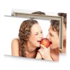 a man and woman are eating an apple white canvas - Image 4