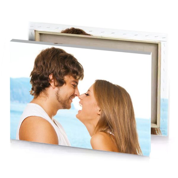 a man and woman are kissing on the beach white smoke canvas - Image 4