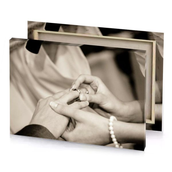 a man and woman holding hands while they are putting silver canvas - Image 4