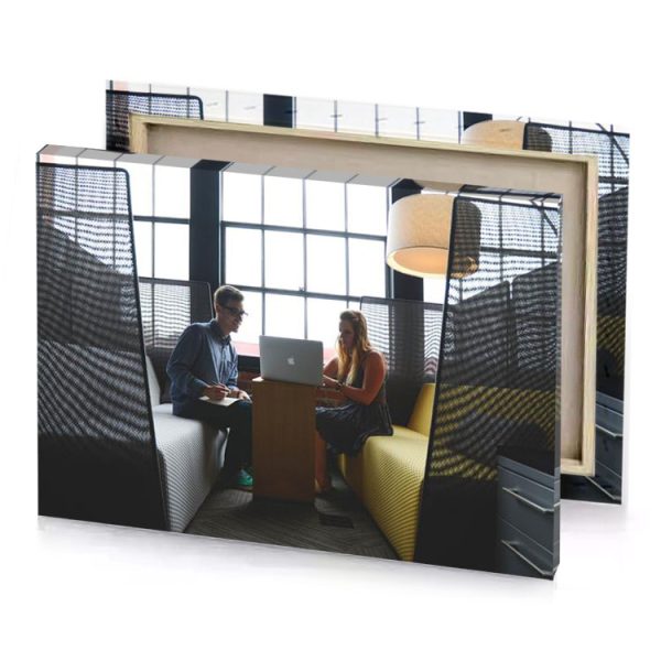 a man and woman sitting in room with laptop ghost white canvas - Image 4