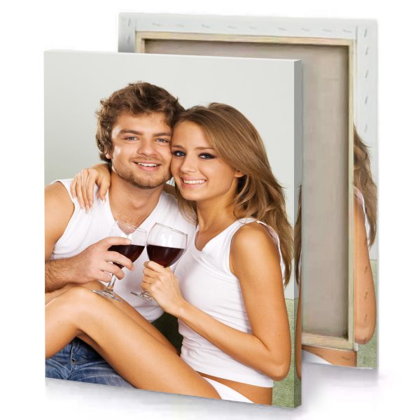 a man and woman sitting on couch holding wine glasses platinum canvas - Image 4