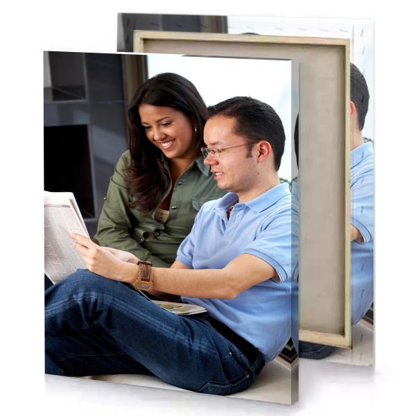 a man and woman sitting on couch reading book smoky black canvas - Image 4
