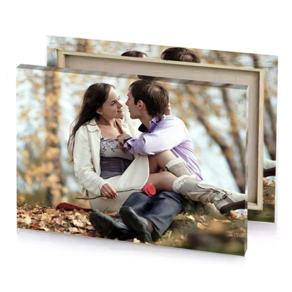 a man and woman sitting on the ground in fall platinum canvas - Image 4