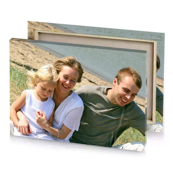 a man and woman sitting on the ground tan canvas - Image 4