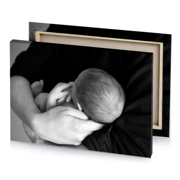 a man holding baby in his arms platinum canvas - Image 4