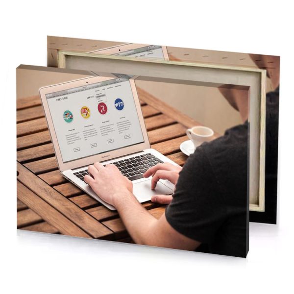a man is typing on laptop wooden table smoky black canvas - Image 4