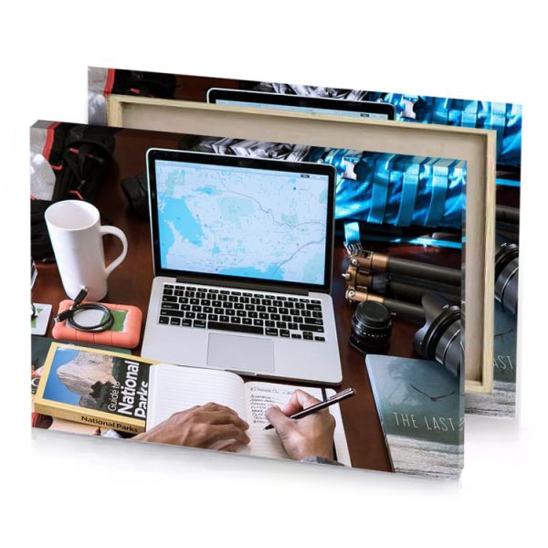 a man is writing on notebook with laptop periwinkle canvas - Image 4