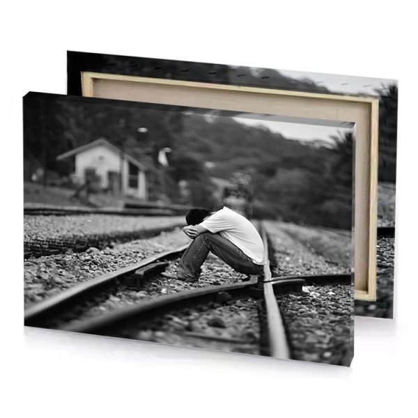 a man kneeling on the tracks of train track manatee canvas - Image 4
