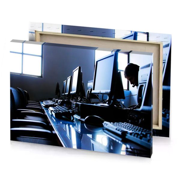 a man sitting at desk with multiple computer monitors dark slate blue canvas - Image 4