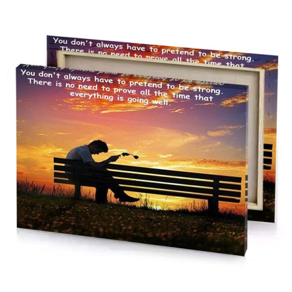 a man sitting on bench with the sun setting behind smoky black canvas - Image 4