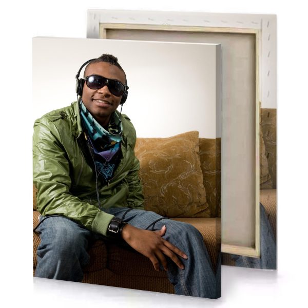 a man sitting on couch wearing headphones linen canvas - Image 4