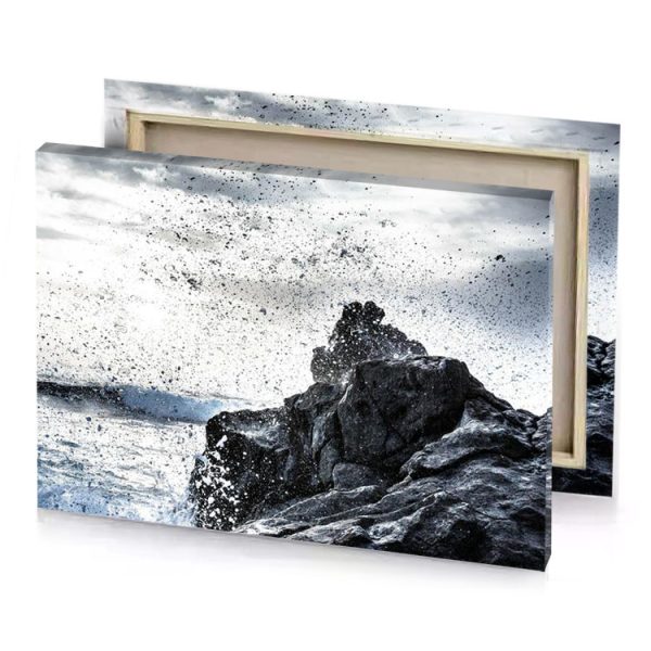 a man standing on top of rock near the ocean white smoke canvas - Image 4