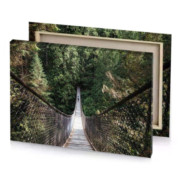 a man walking across suspension bridge in the forest bistre canvas - Image 4
