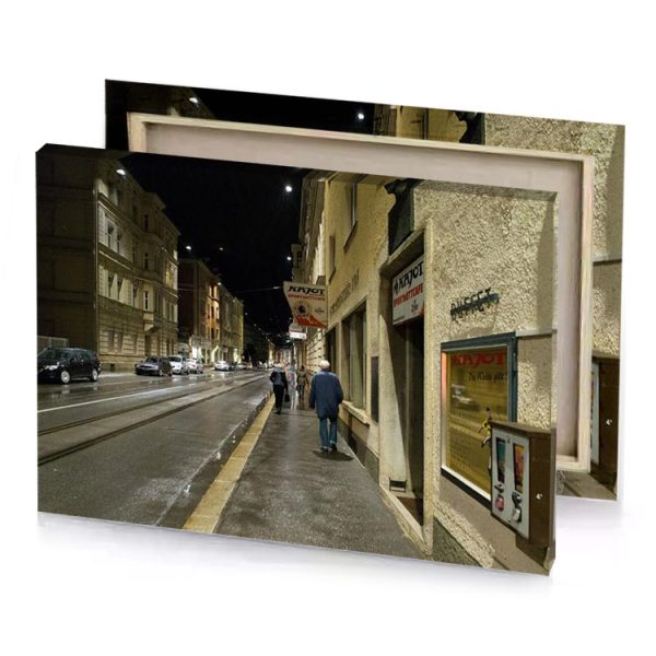 a man walking down street next to building dim gray canvas - Image 4