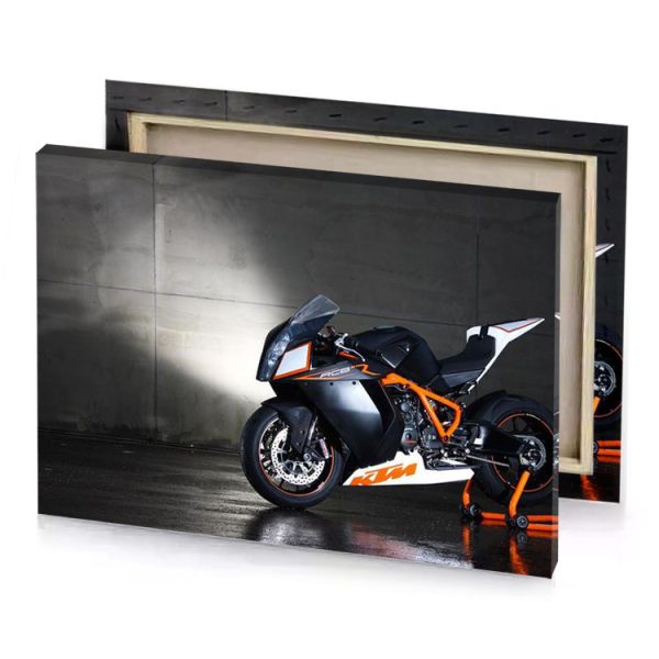 a motorcycle parked in garage with light shining on the linen canvas - Image 4