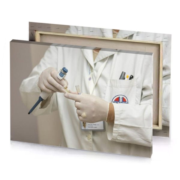 a person in lab coat holding tooth silver canvas - Image 4