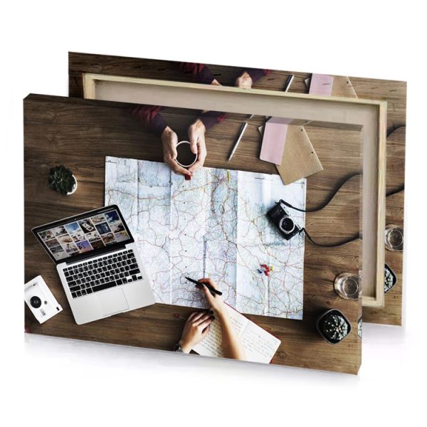 a person is using laptop and map platinum canvas - Image 4