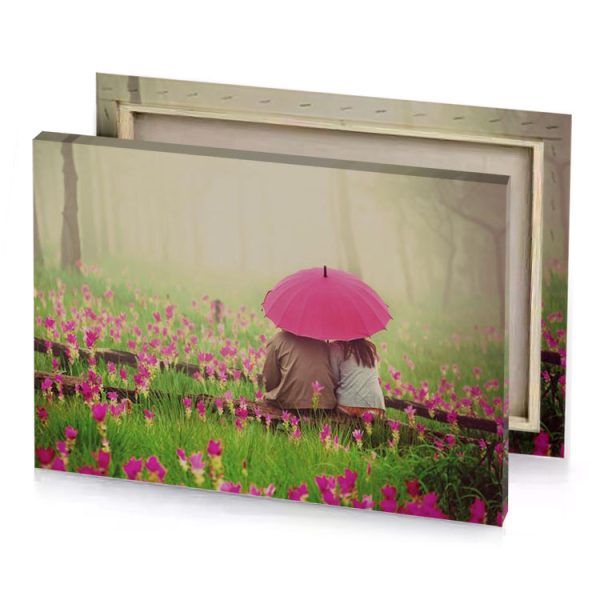 a person sitting in the grass with an umbrella indian red canvas - Image 4