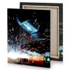 a person welding piece of metal taupe canvas - Image 4